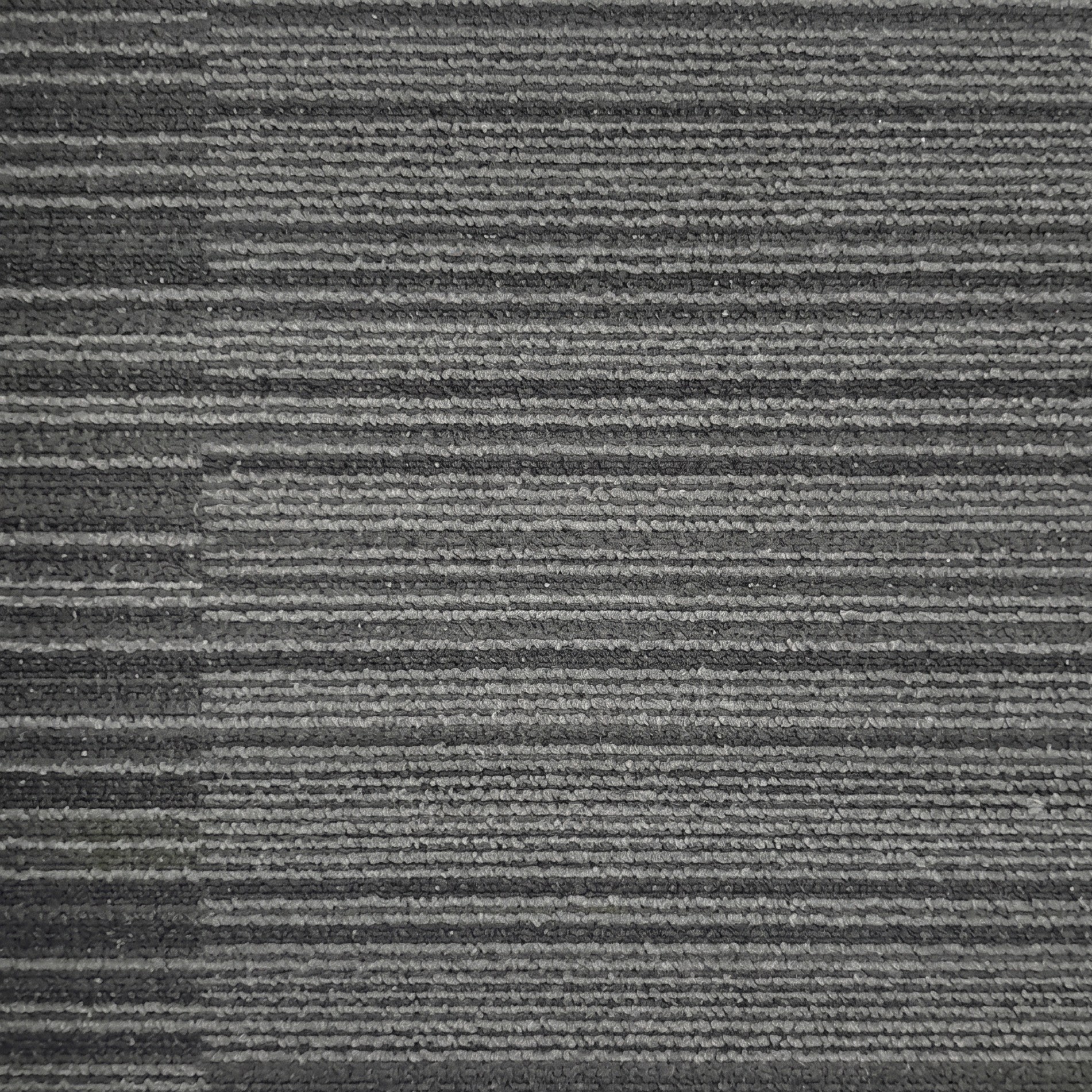 Dark grey linear carpet tile selected for the project