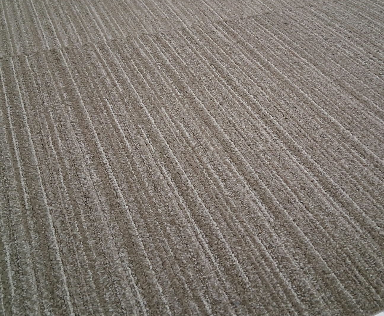 Light grey linear carpet tile selected for the project